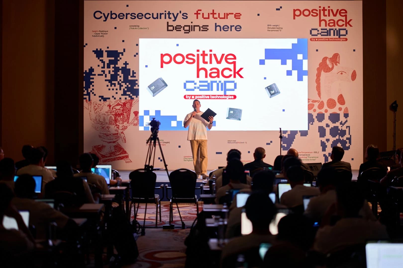 A speaker presenting to a conference audience